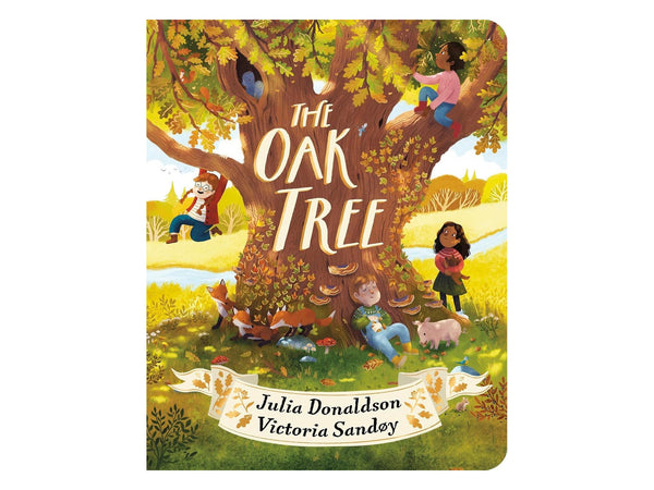 Front cover of The Oak Tree board book by Julia Donaldson and Victoria Sandøy, showing children climbing and resting in a great autumn oak with foxes and a pig beneath