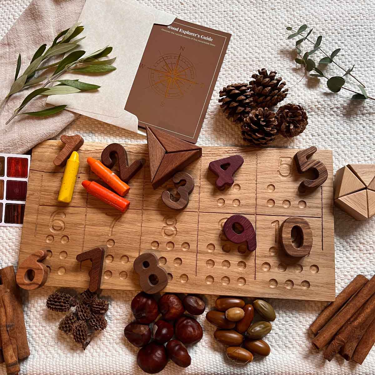 Wooden number puzzle on a textured surface with natural elements