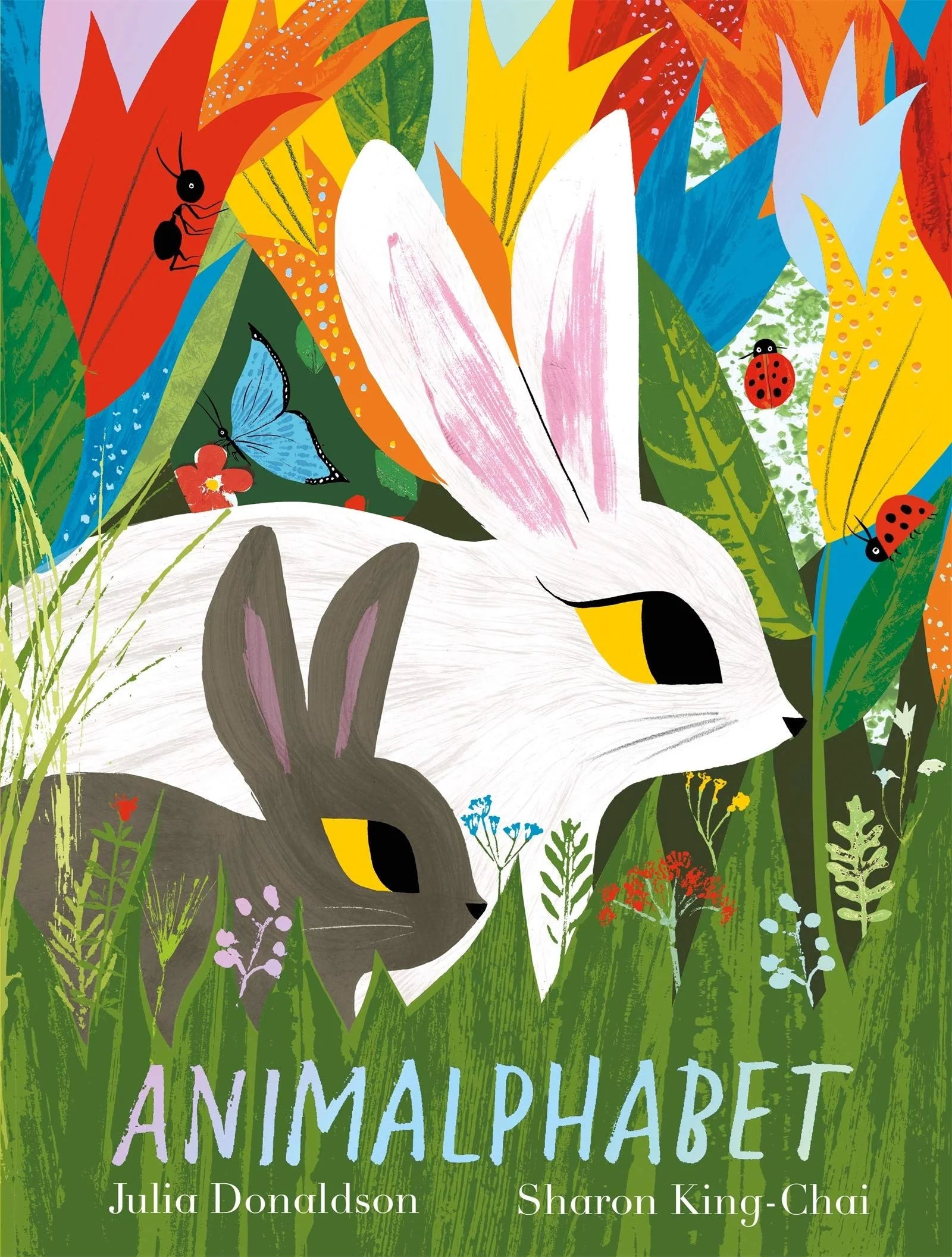 Animalphabet book front cover by Julia Donaldson, showing two rabbits amid colourful folk-art flowers and foliage