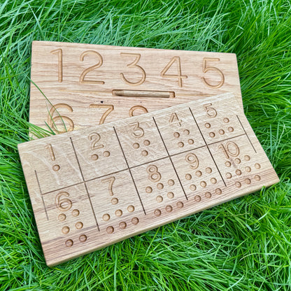 Wooden number puzzle on grass