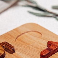 Heirloom wooden puzzle with natural hardwood colours (Purpleheart, Oak)